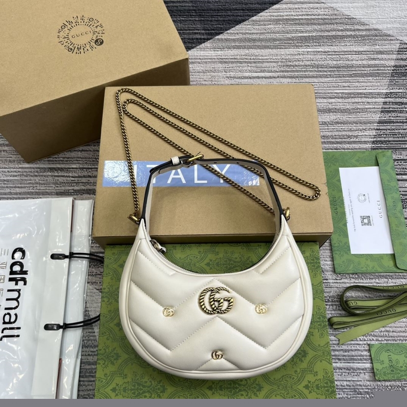 G*u*i top handle bags